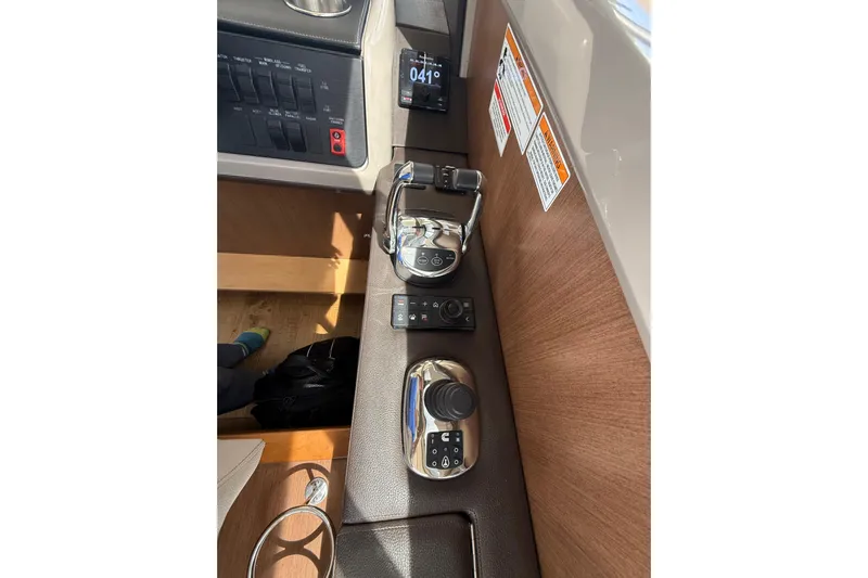 Tea Time III Yacht Photos Pics Control panel of a 2018 Sea Ray Fly 400 yacht with modern navigation equipment.