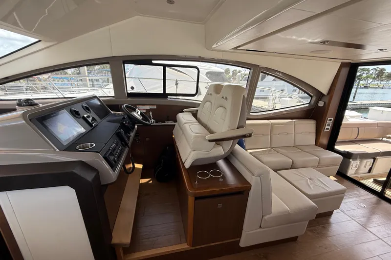 Tea Time III Yacht Photos Pics Interior of 2018 Sea Ray Fly 400 yacht with modern helm and plush seating.