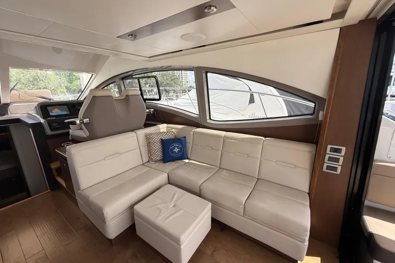 Tea Time III Yacht Photos Pics Luxurious interior of 2018 Sea Ray Fly 400 yacht with plush seating and modern design.
