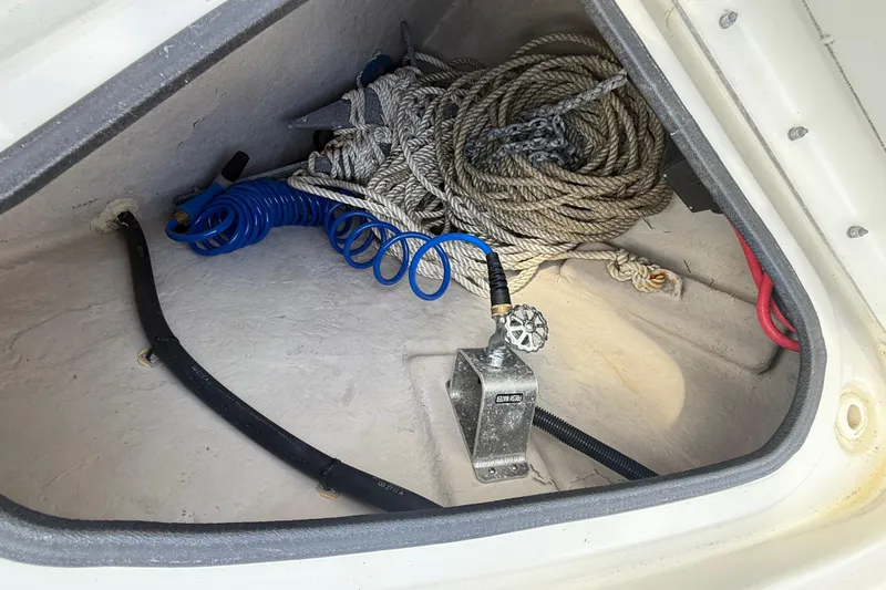 Tea Time III Yacht Photos Pics Storage compartment of 2018 Sea Ray Fly 400 with ropes and hoses.