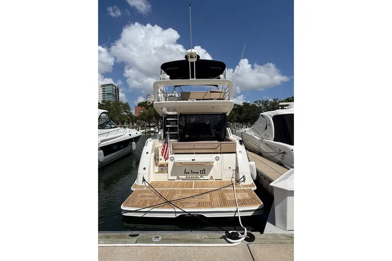 Tea Time III Yacht Photos Pics 2018 Sea Ray Fly 400 yacht docked at marina under blue sky.