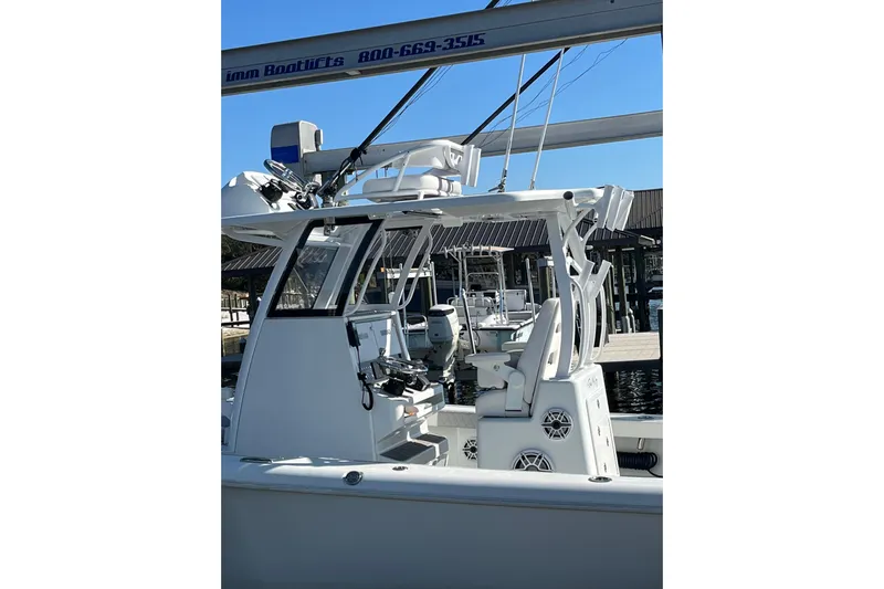  Yacht Photos Pics 2022 Costa Custom Boats 264, sleek design, docked at marina under clear blue sky.