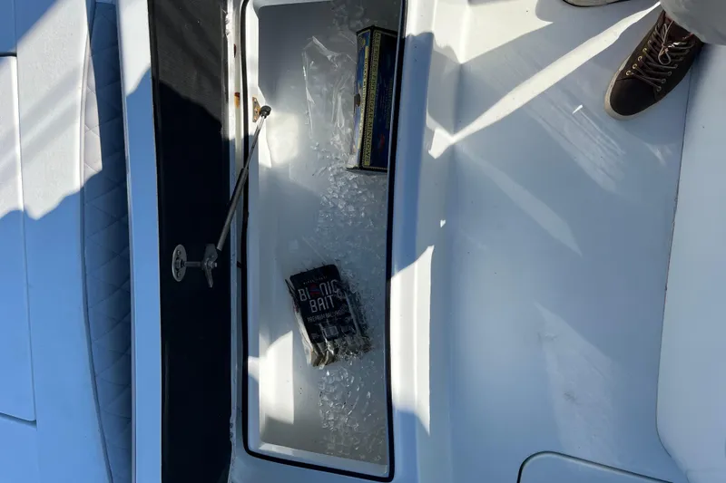  Yacht Photos Pics Ice-filled storage compartment on 2022 Costa Custom Boats 264, containing bait packages.