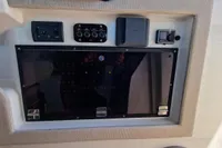 Control panel of 2024 Saxdor 320 GTC boat with various switches and displays.
