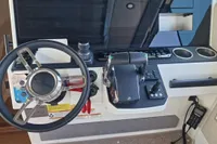 2024 Saxdor 320 GTC helm with steering wheel, controls, and display panel.