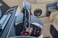 Throttle control of 2024 Saxdor 320 GTC boat, featuring start/stop button and control panel.