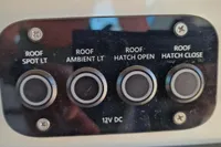 Control panel with buttons for roof lighting and hatch operations on 2024 Saxdor 320 GTC.