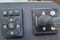 Control panel of 2024 Saxdor 320 GTC with joystick and directional buttons.