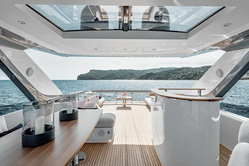  Yacht Photos Pics Luxurious 2025 Azimut 78 Flybridge yacht interior with ocean view and elegant furnishings.