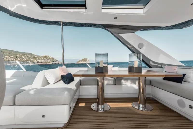  Yacht Photos Pics Luxurious 2025 Azimut 78 Flybridge yacht interior with elegant seating and ocean view.