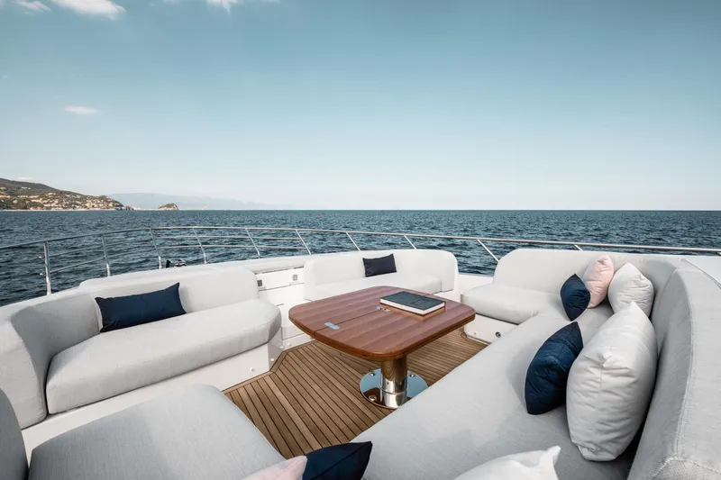  Yacht Photos Pics Luxurious 2025 Azimut 78 Flybridge yacht deck with elegant seating and ocean view.