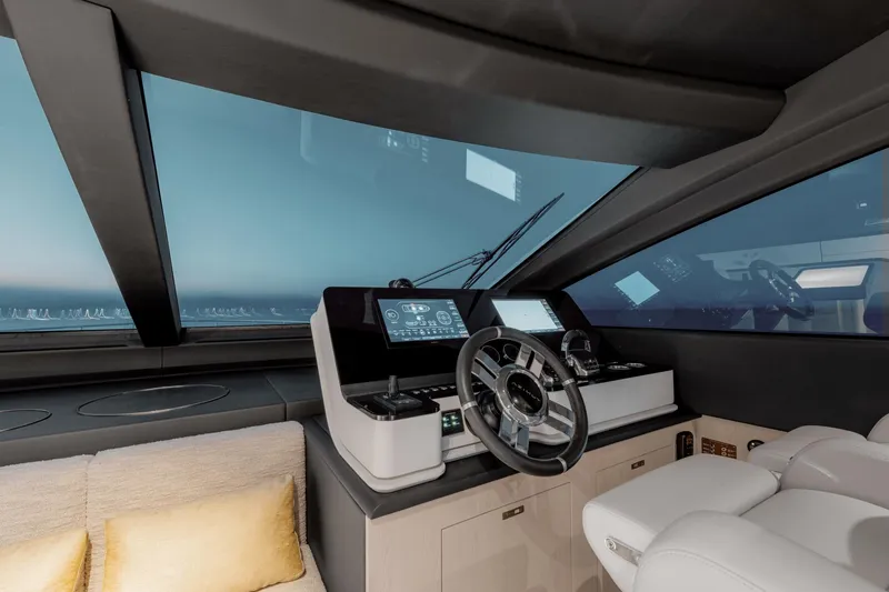  Yacht Photos Pics Luxurious 2025 Azimut 78 Flybridge yacht cockpit with modern controls and panoramic view.