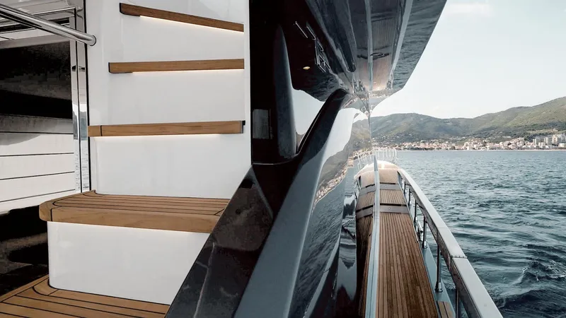  Yacht Photos Pics 2025 Azimut 78 Flybridge yacht with sleek design, wooden steps, and ocean view.