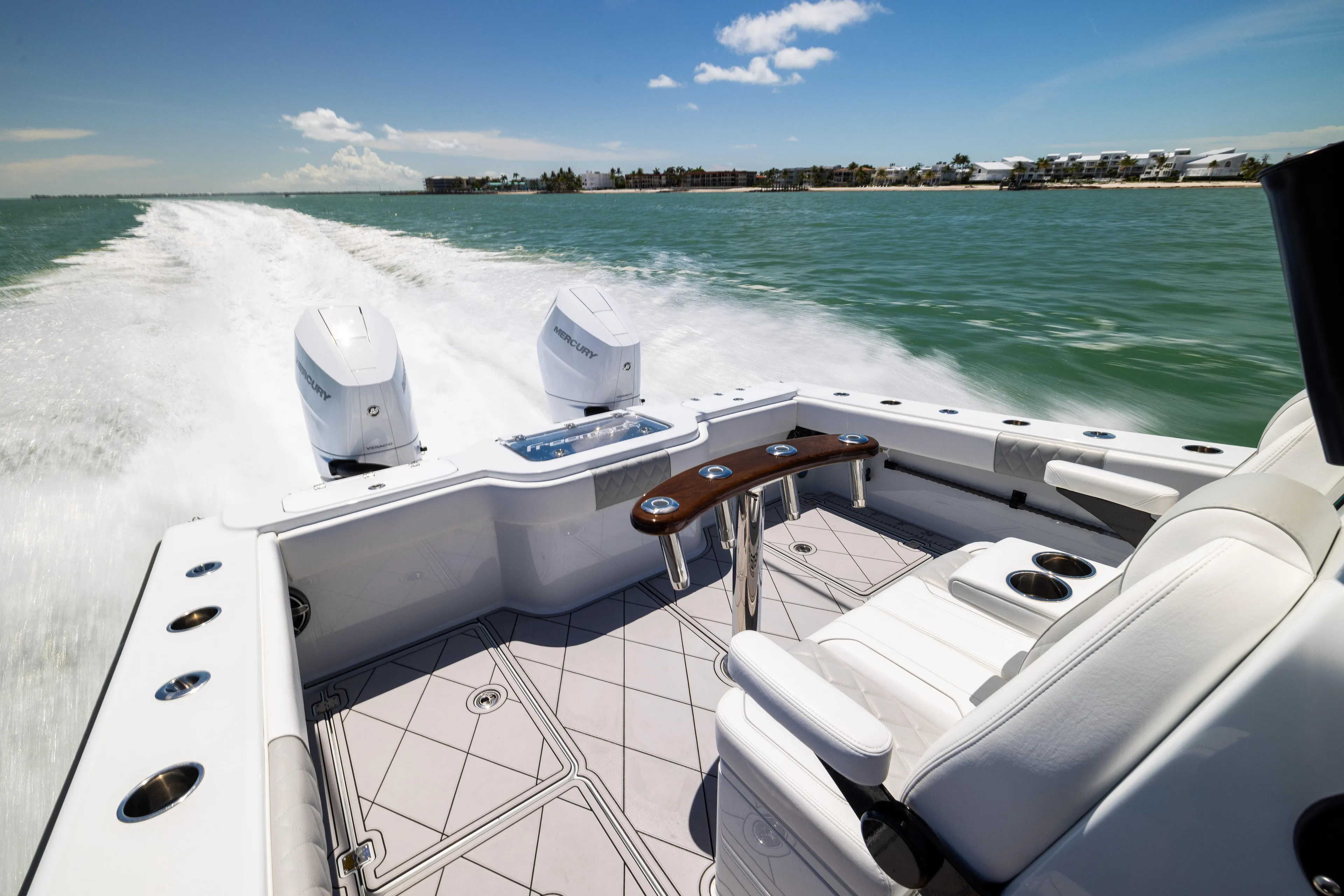  Yacht Photos Pics Freeman 34 VH 2025 boat cruising on open water, featuring dual Mercury engines.