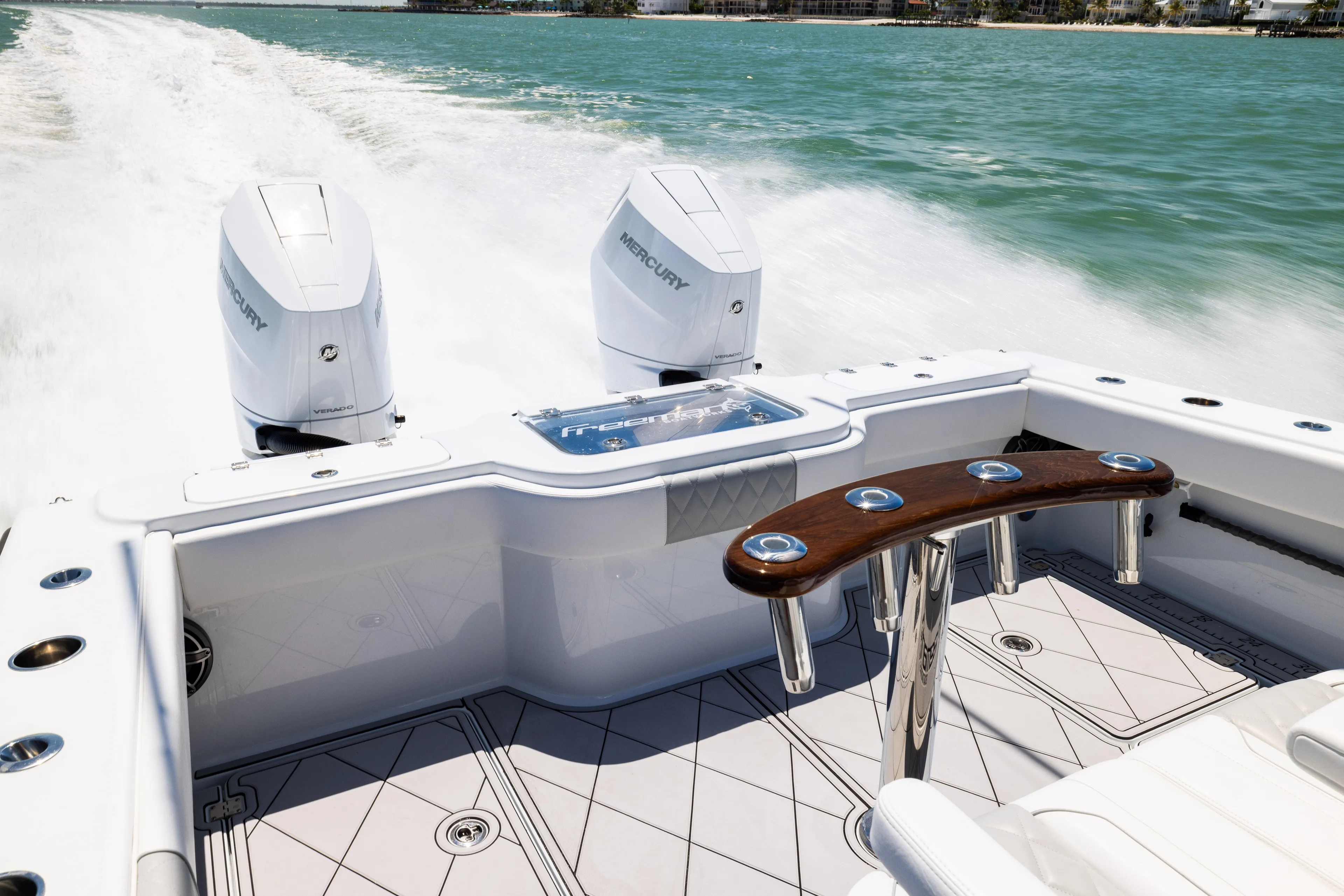  Yacht Photos Pics Freeman 34 VH 2025 boat with dual Mercury engines cruising on open water.