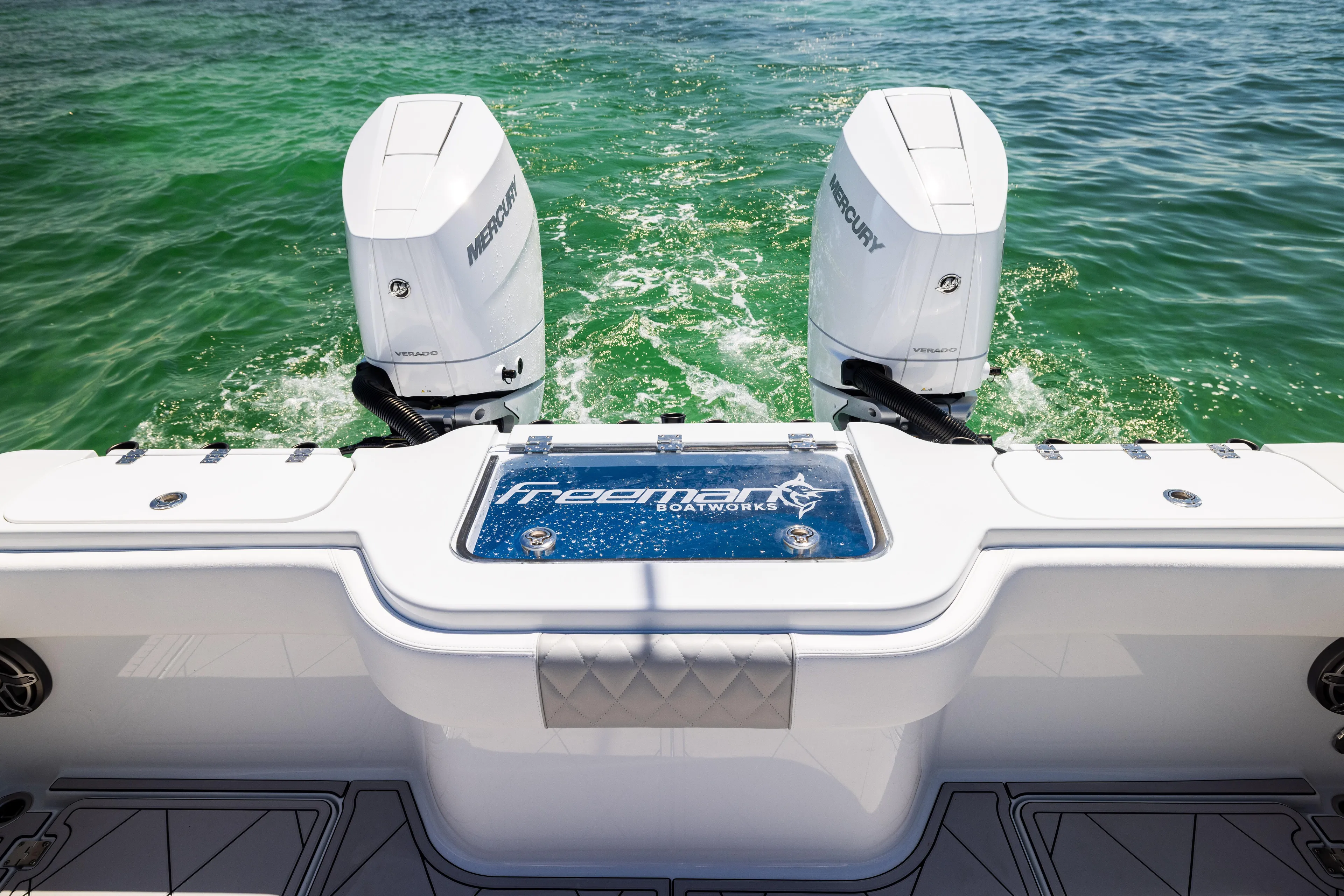  Yacht Photos Pics Freeman 34 VH 2025 boat with dual Mercury engines on clear water.