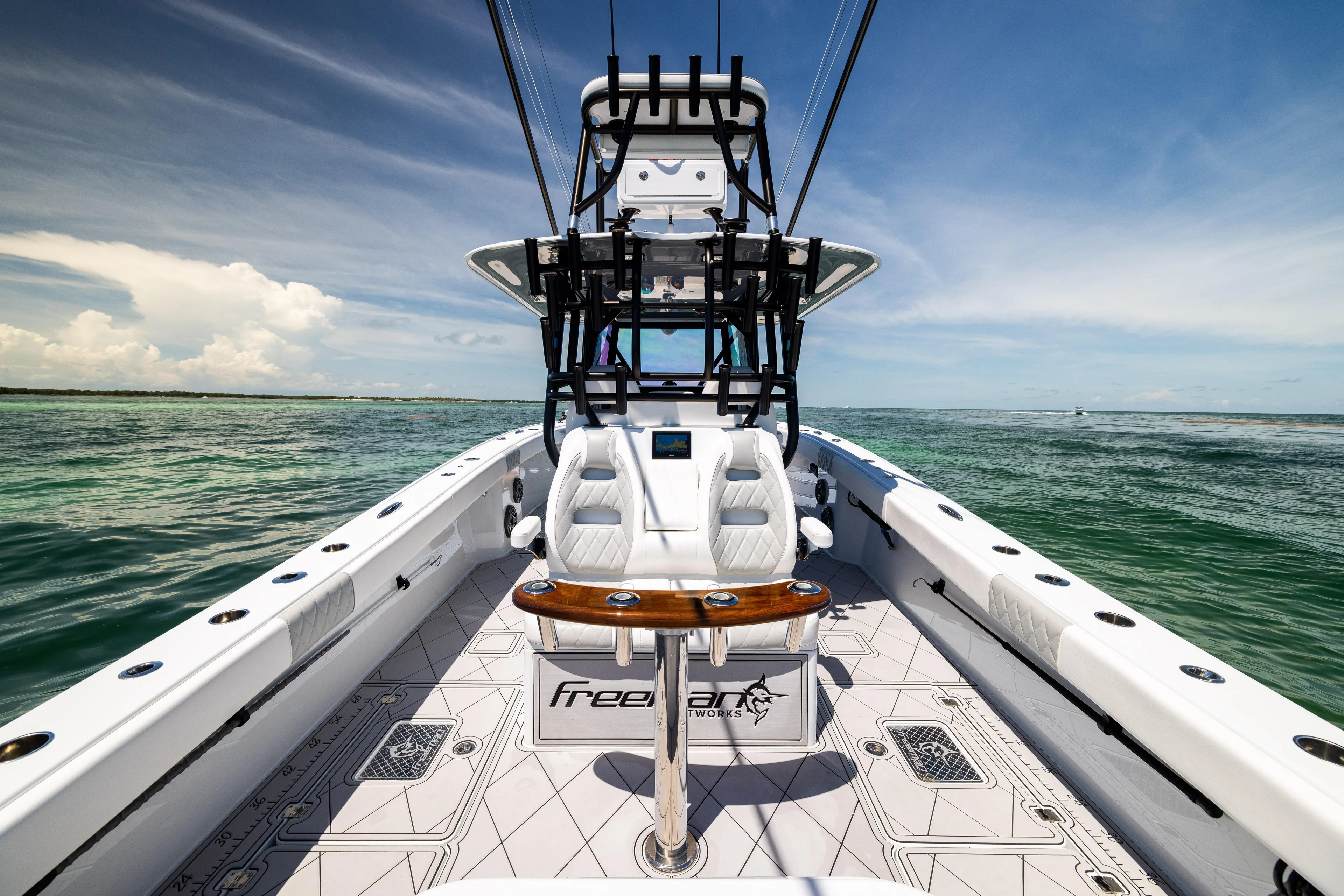  Yacht Photos Pics Freeman 34 VH 2025 boat on open water, featuring sleek design and modern amenities.