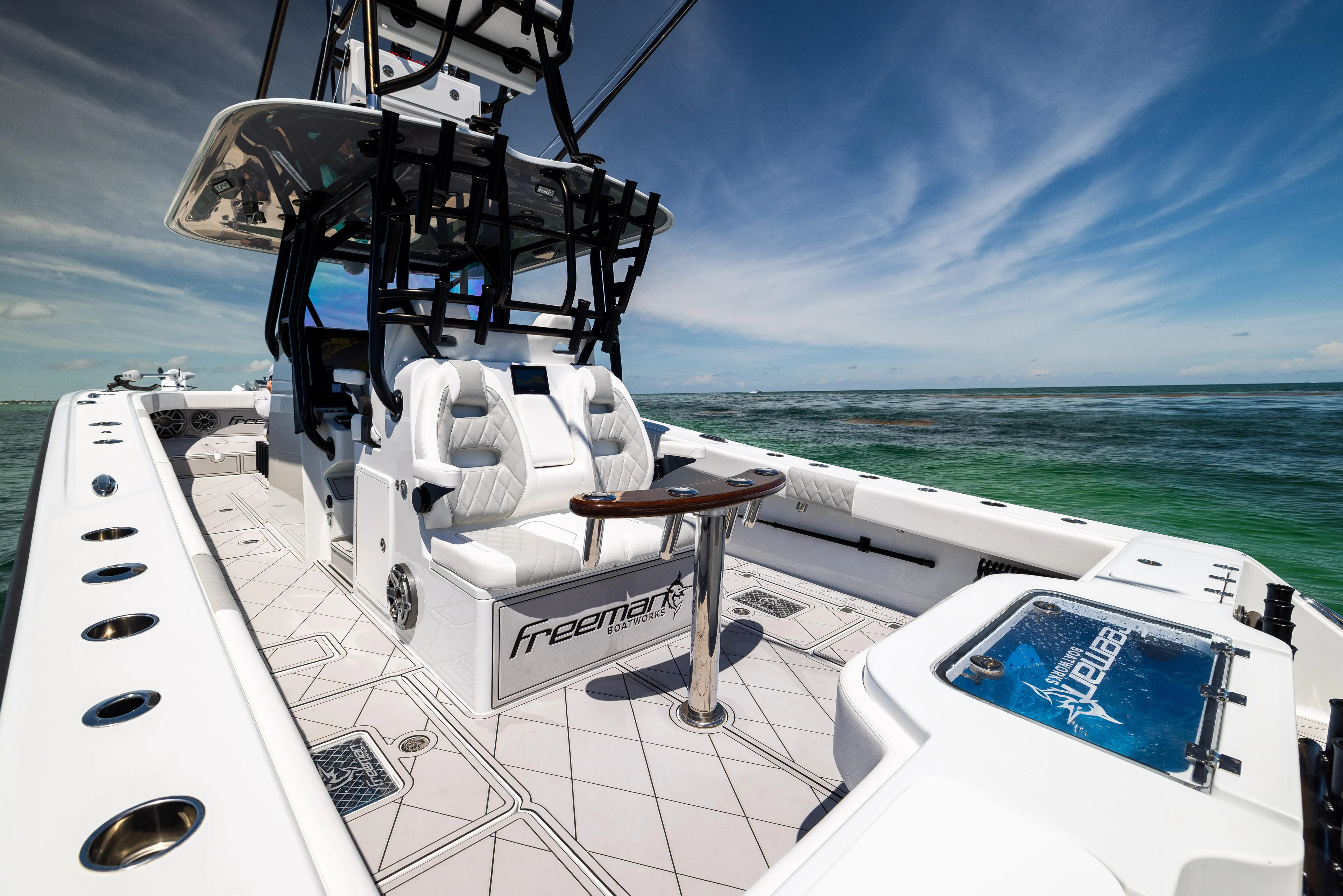  Yacht Photos Pics 2025 Freeman 34 VH boat interior with luxurious seating and ocean view.