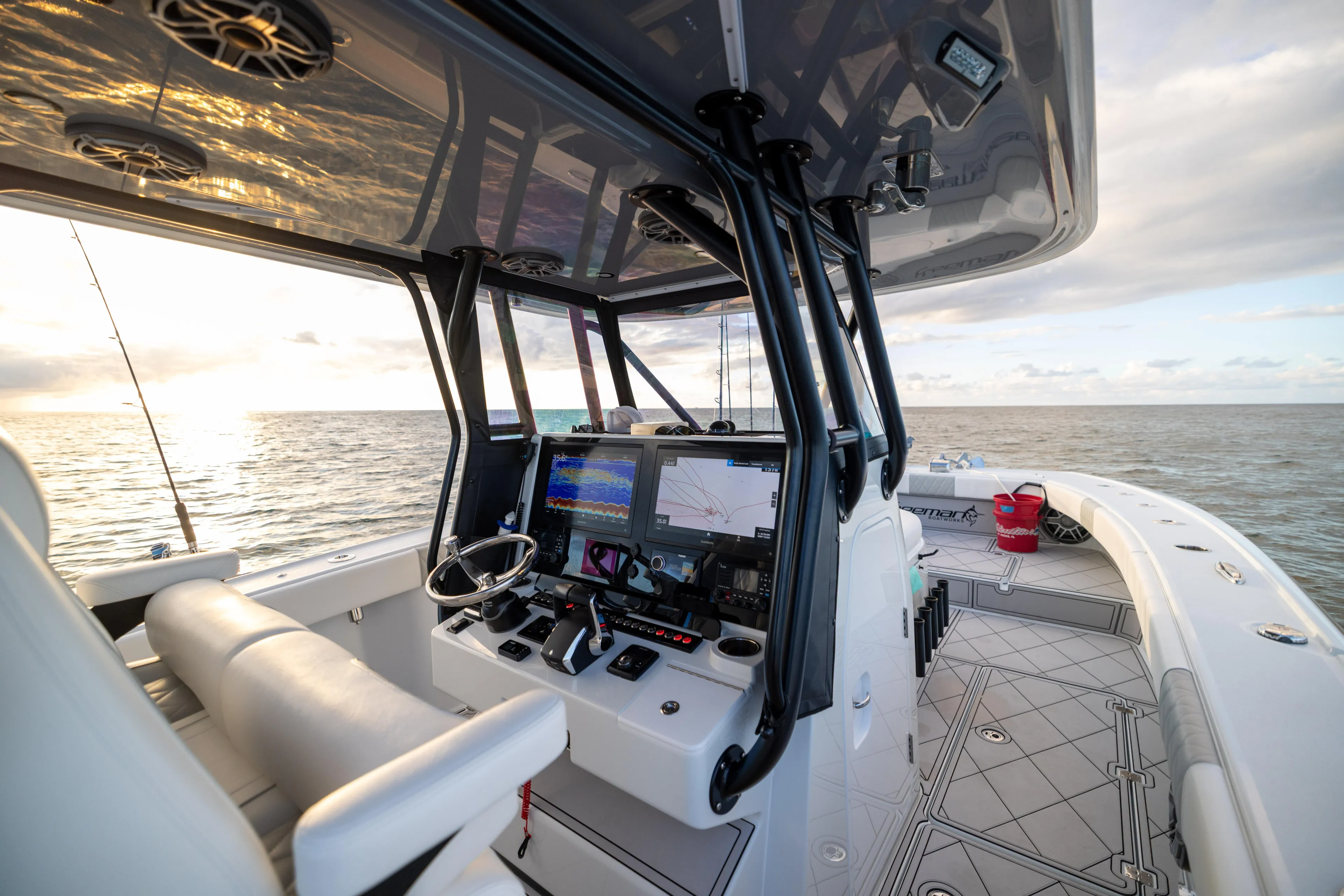  Yacht Photos Pics Modern Freeman 34 VH boat interior with advanced navigation system, 2025 model, on open water.