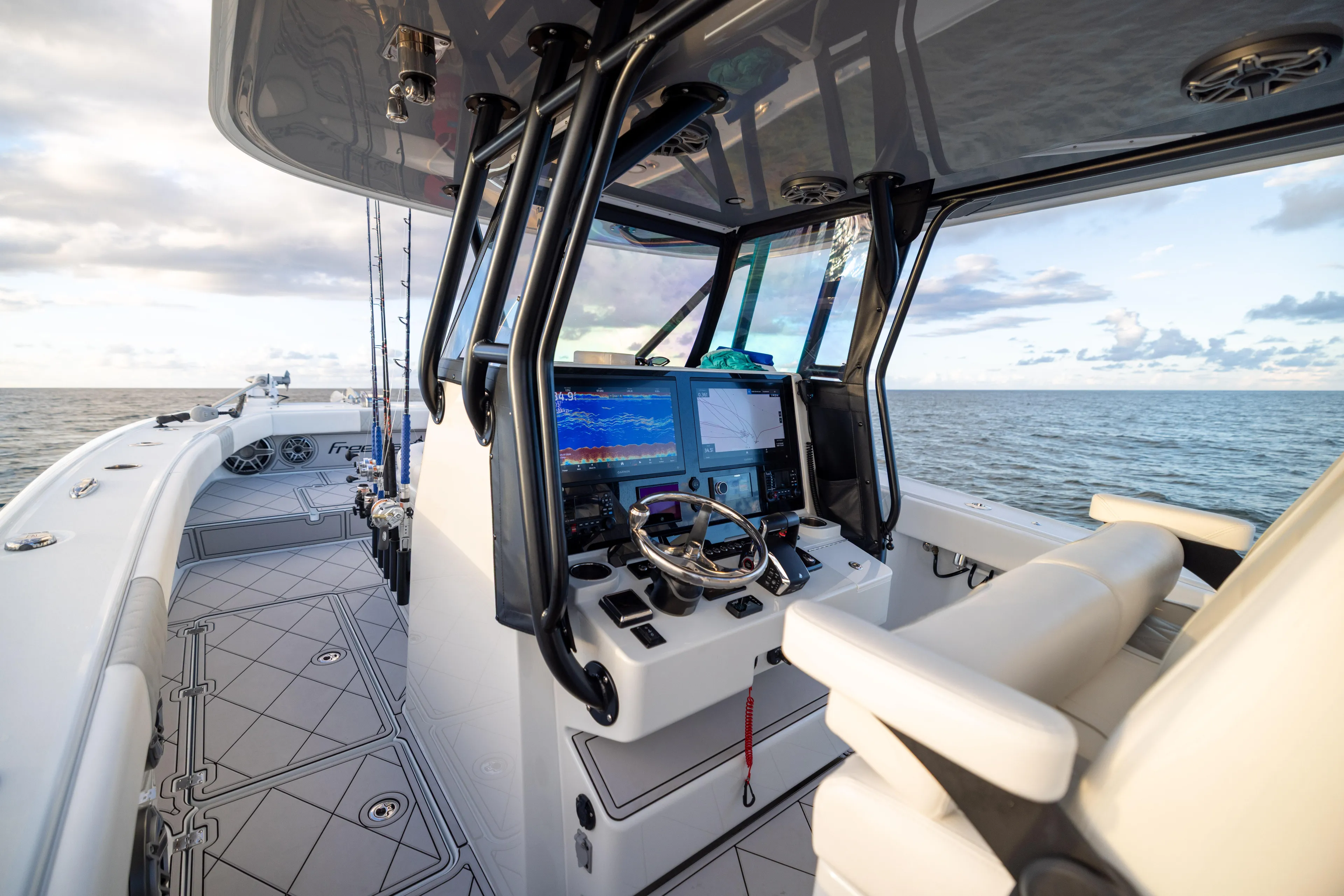  Yacht Photos Pics Freeman 34 VH 2025 boat cockpit with advanced navigation system, ocean view.