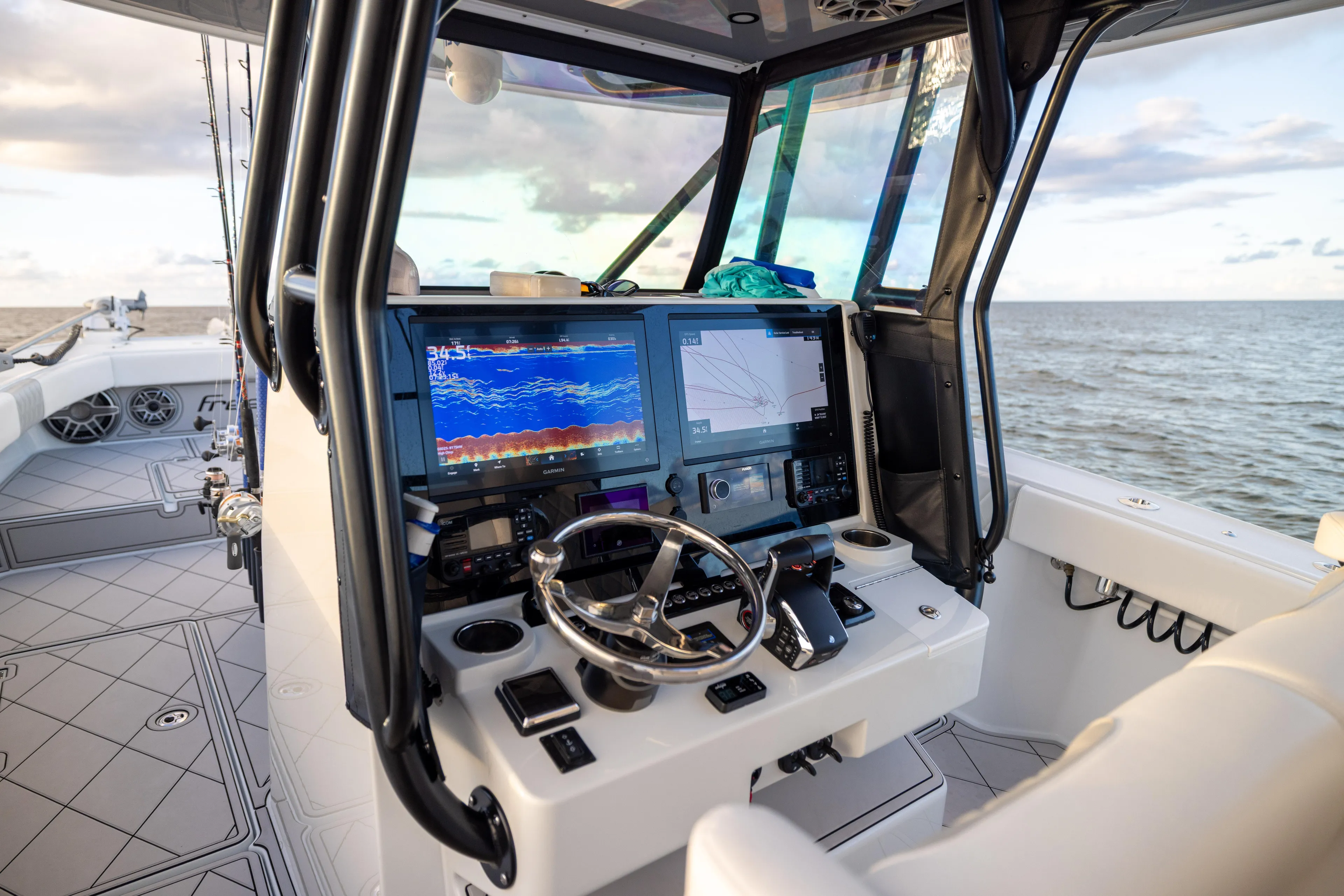  Yacht Photos Pics 2025 Freeman 34 VH boat cockpit with advanced navigation system and ocean view.