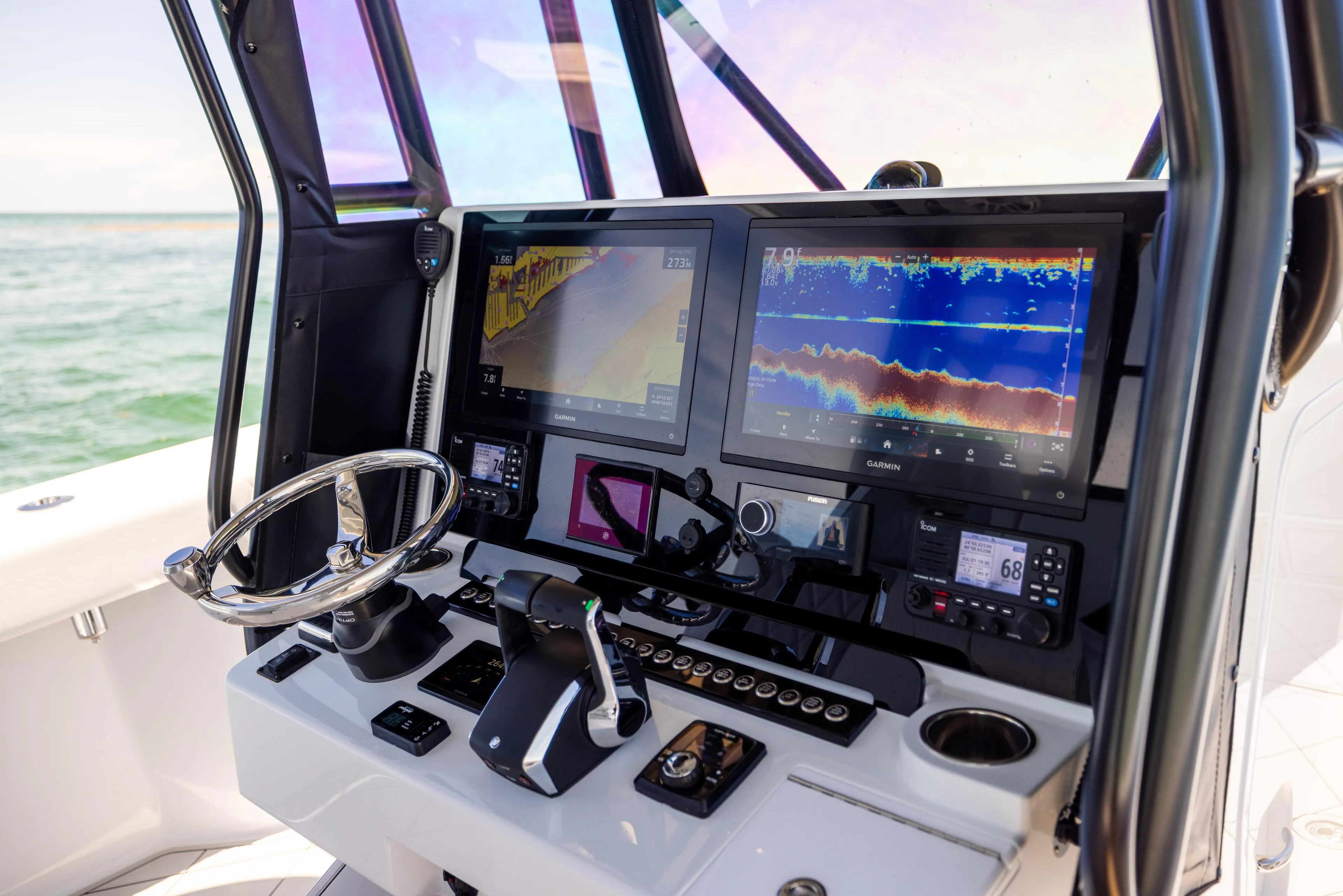  Yacht Photos Pics Helm of 2025 Freeman 34 VH boat with advanced navigation displays and controls.