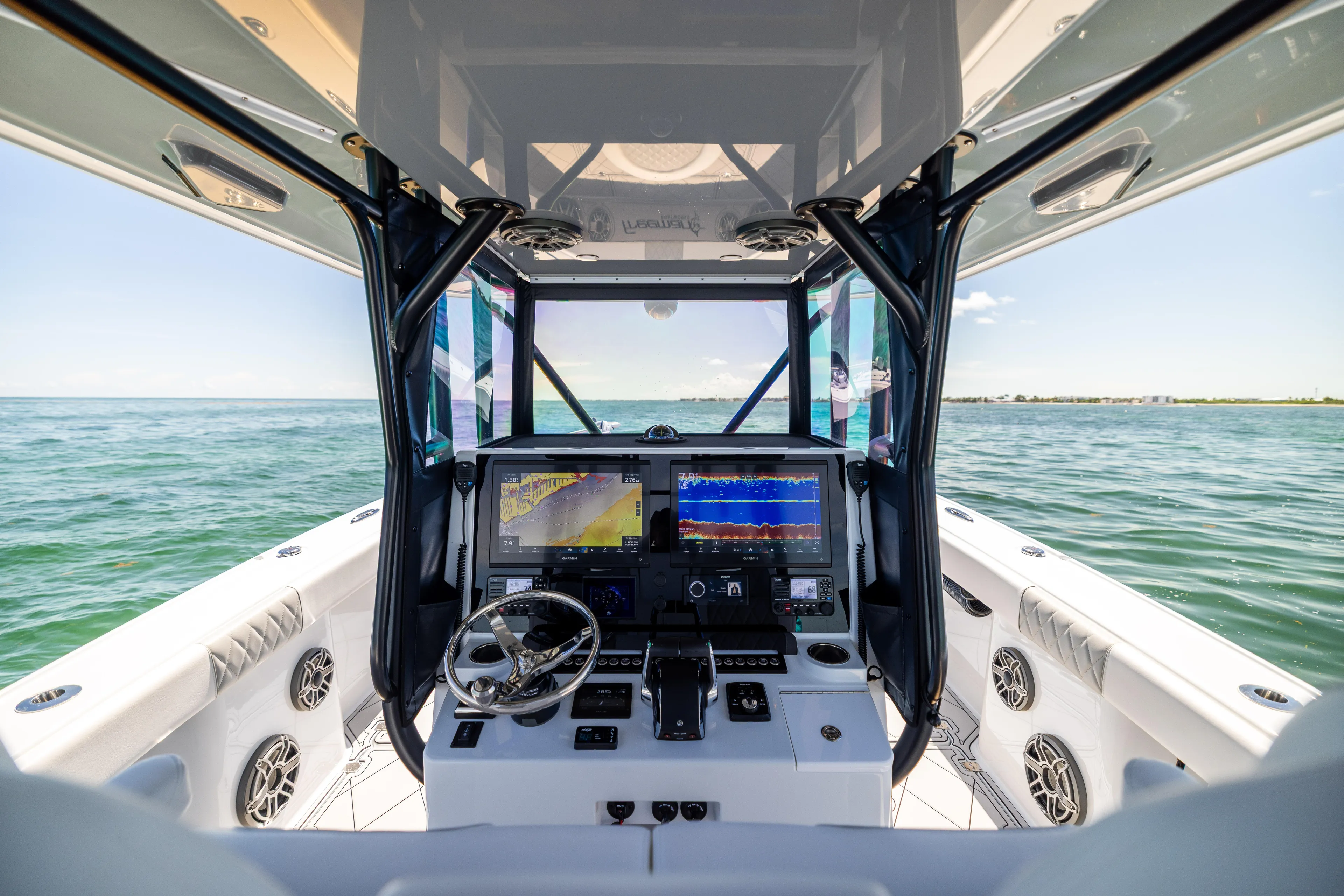  Yacht Photos Pics Interior view of 2025 Freeman 34 VH boat cockpit with advanced navigation system.