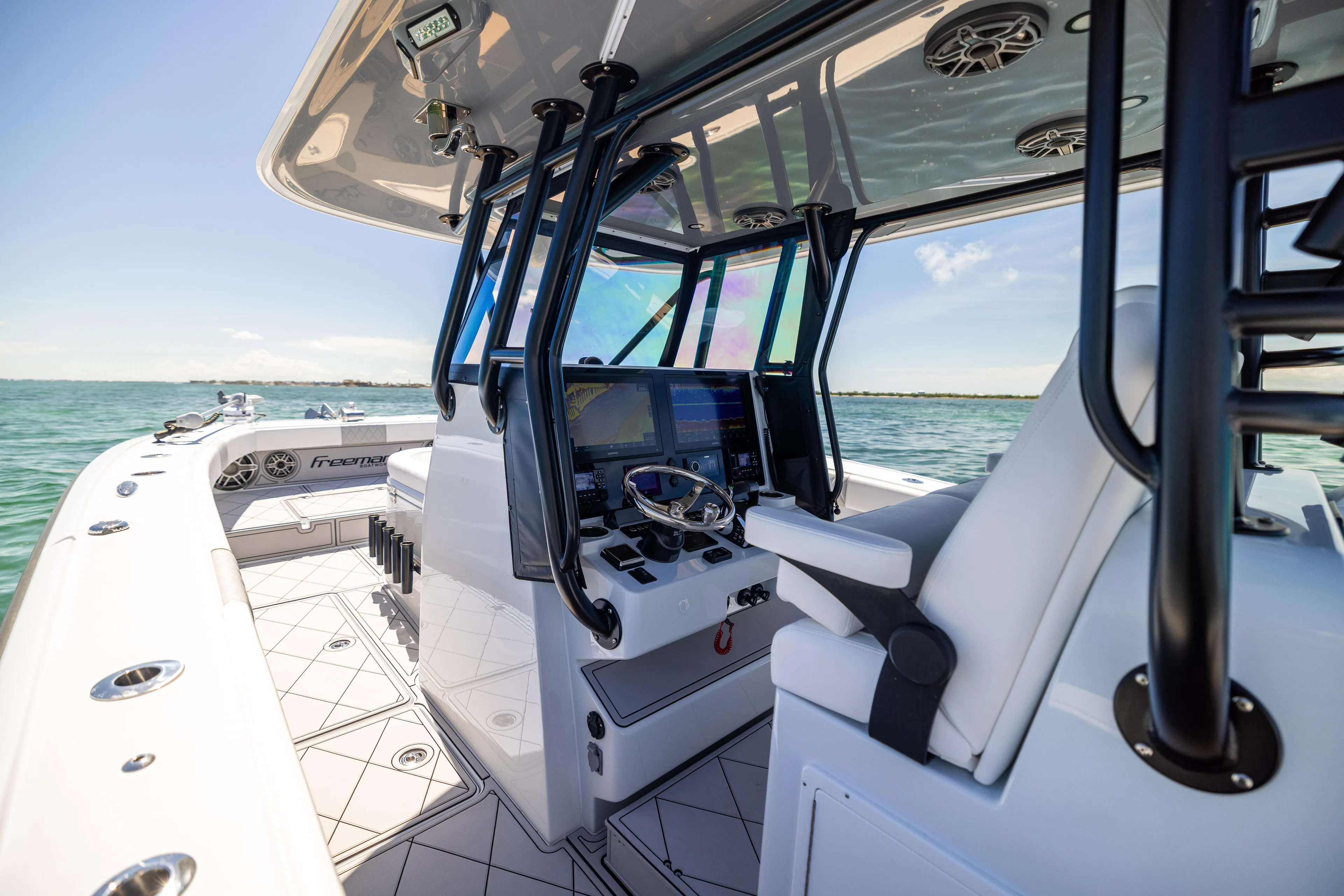 Yacht Photos Pics 2025 Freeman 34 VH boat interior with advanced navigation system on open water.