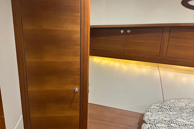 “no Name” Yacht Photos Pics Luxurious wooden interior of 2017 Palm Beach PB42 yacht cabin with ambient lighting.