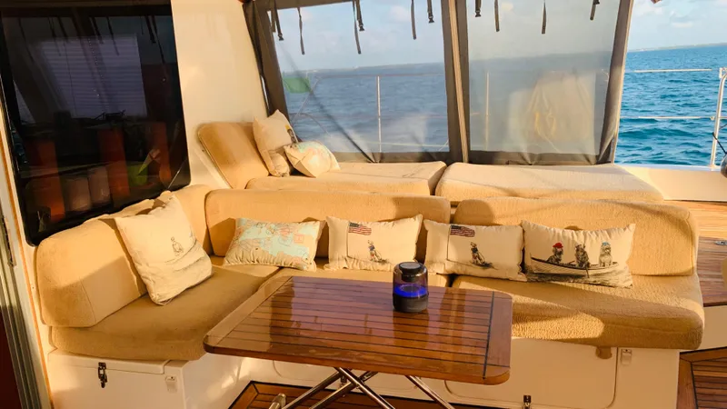 Talon Yacht Photos Pics Luxurious Sunreef 62 yacht interior with cozy seating and ocean view, 2011 model.