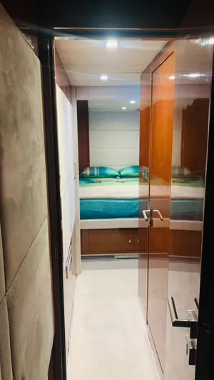 Talon Yacht Photos Pics Luxurious cabin interior of 2011 Sunreef 62 yacht with modern design and cozy bedding.