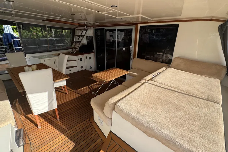 Talon Yacht Photos Pics Luxurious Sunreef 62 yacht interior, featuring elegant seating and dining area, 2011 model.