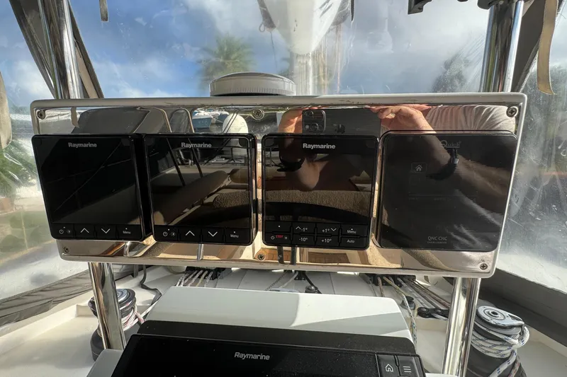 Talon Yacht Photos Pics Control panel of a 2011 Sunreef 62 yacht with Raymarine displays.