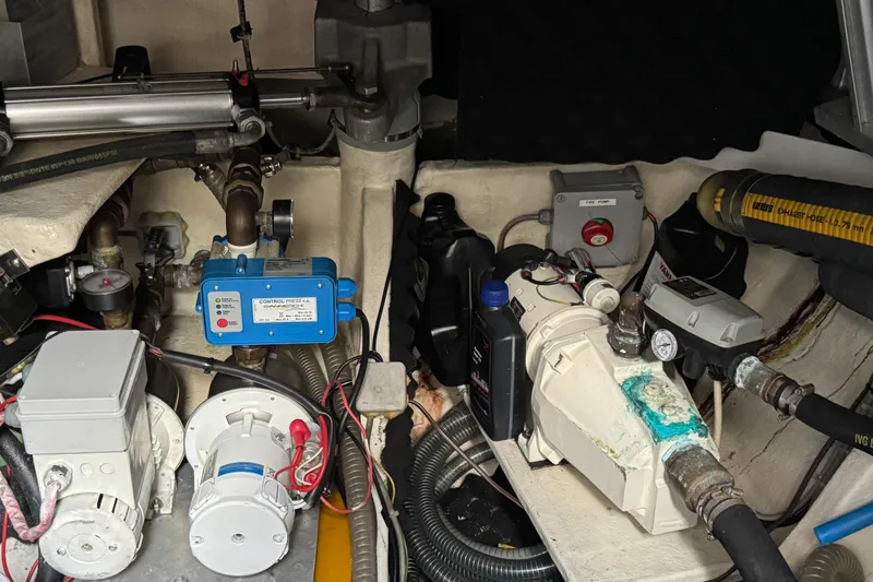 Talon Yacht Photos Pics Engine room of a 2011 Sunreef 62 yacht, showcasing mechanical components and equipment.