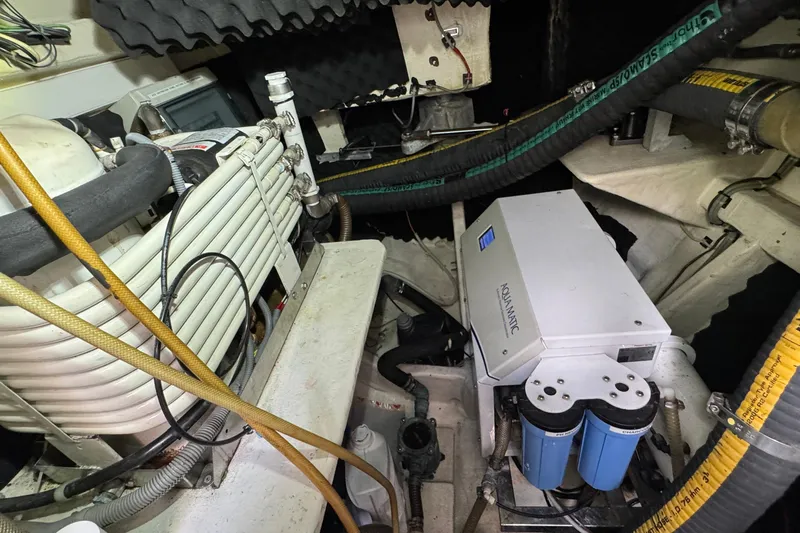 Talon Yacht Photos Pics Engine room of 2011 Sunreef 62 yacht with Aquamatic system and various components.