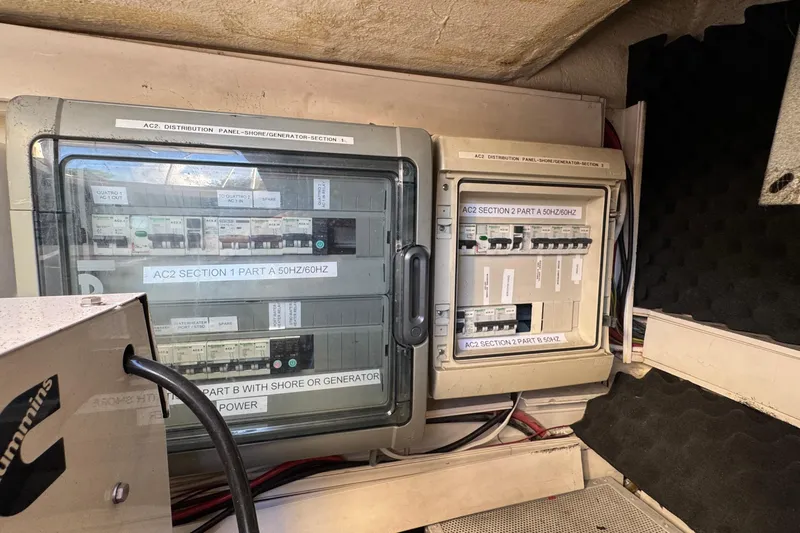 Talon Yacht Photos Pics Electrical panel on a 2011 Sunreef 62 yacht, featuring AC distribution and circuit breakers.