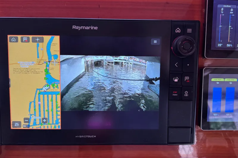Talon Yacht Photos Pics Raymarine navigation system on 2011 Sunreef 62 yacht, displaying maps and camera feed.
