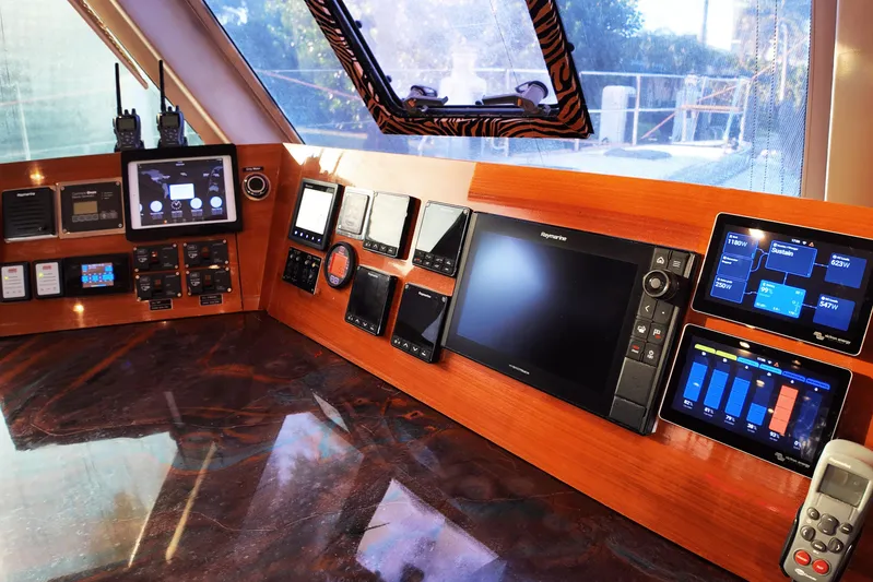 Talon Yacht Photos Pics Control panel of a 2011 Sunreef 62 yacht with advanced navigation and communication systems.