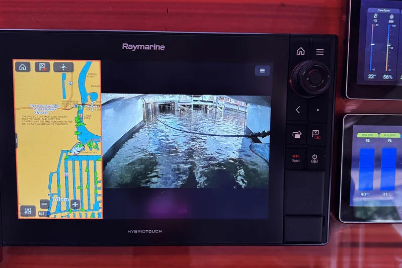 Talon Yacht Photos Pics Raymarine navigation system on 2011 Sunreef 62 yacht, displaying map and camera view.
