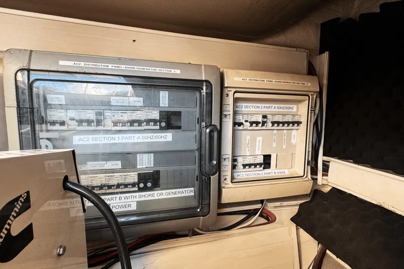 Talon Yacht Photos Pics Electrical panel on a 2011 Sunreef 62 yacht, featuring AC distribution and generator controls.