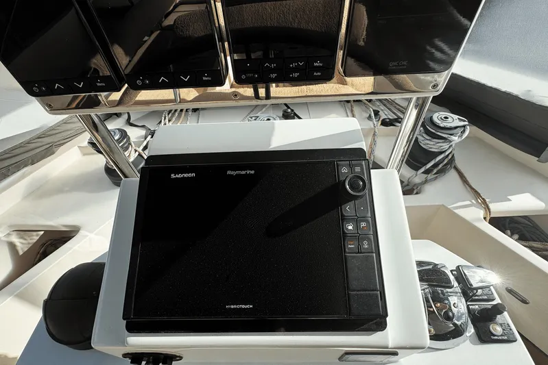 Talon Yacht Photos Pics Control panel of a 2011 Sunreef 62 yacht with navigation equipment.