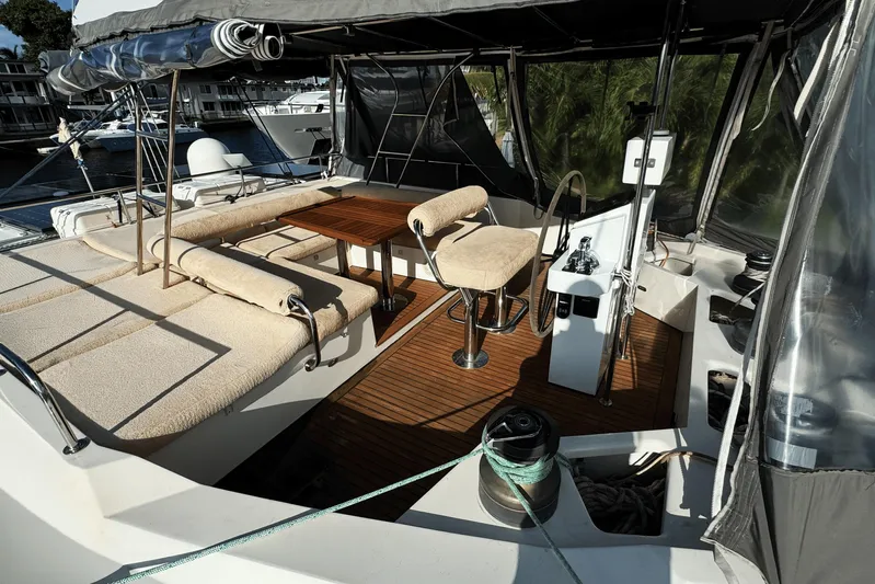 Talon Yacht Photos Pics Luxurious 2011 Sunreef 62 yacht deck with seating and helm station.