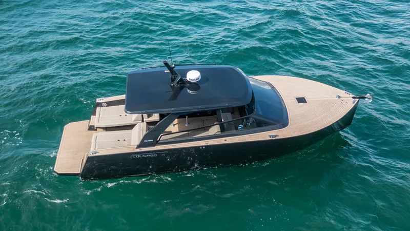  Yacht Photos Pics 2024 Colnago C38 OPEN boat cruising on clear blue water.