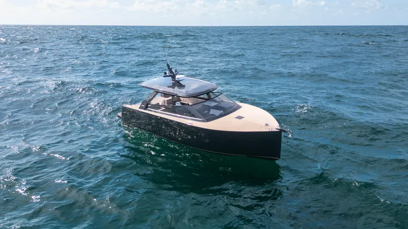  Yacht Photos Pics 2024 Colnago C38 OPEN yacht cruising on open sea under clear skies.