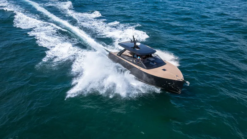  Yacht Photos Pics 2024 Colnago C38 OPEN yacht cruising on open sea, creating dynamic water spray.