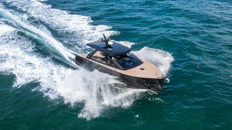  Yacht Photos Pics 2024 Colnago C38 OPEN yacht cruising on open water, creating dynamic waves.