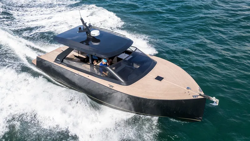  Yacht Photos Pics 2024 Colnago C38 OPEN yacht cruising on the ocean, showcasing sleek design and luxury.