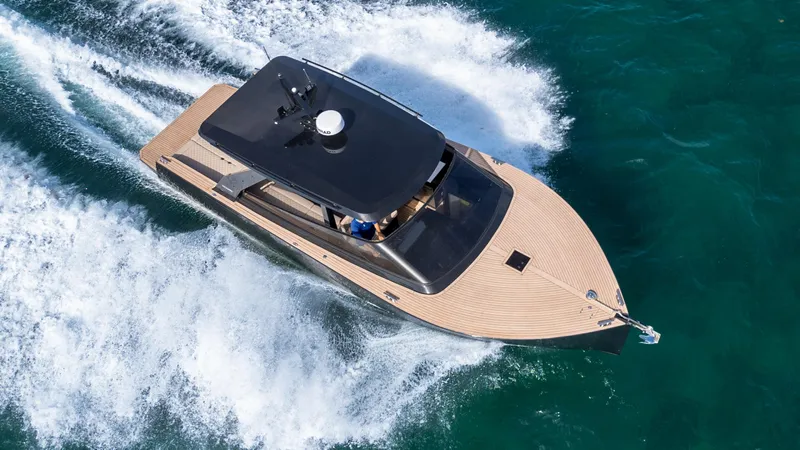  Yacht Photos Pics 2024 Colnago C38 OPEN yacht cruising on vibrant blue waters.