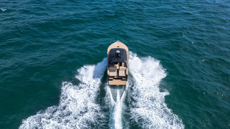  Yacht Photos Pics 2024 Colnago C38 OPEN boat cruising on open sea, aerial view.