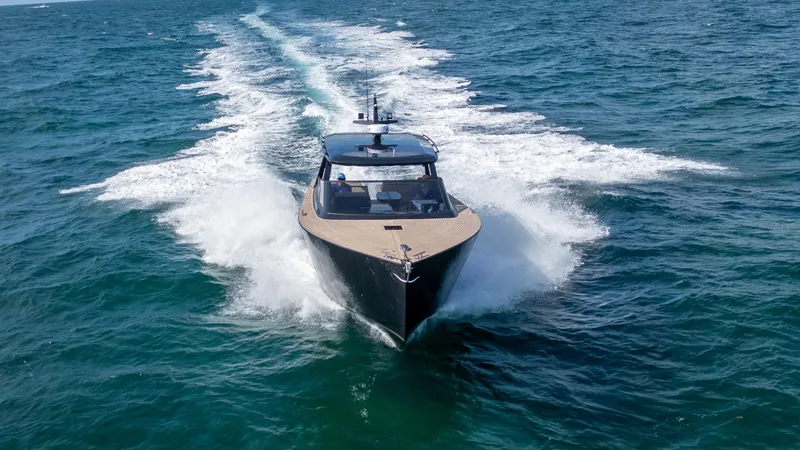  Yacht Photos Pics 2024 Colnago C38 OPEN yacht cruising on open sea, creating a dynamic wake.